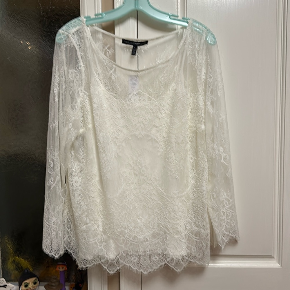 Dressy lace top with camisole underneath.